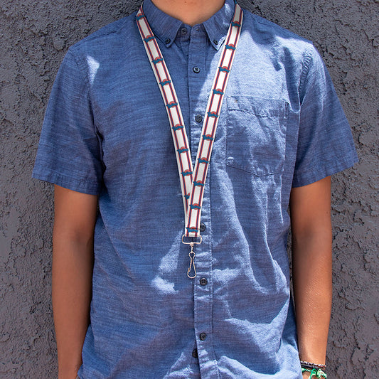 Close-up of the Tune Squad logo and stripe detail on the lanyard strap.