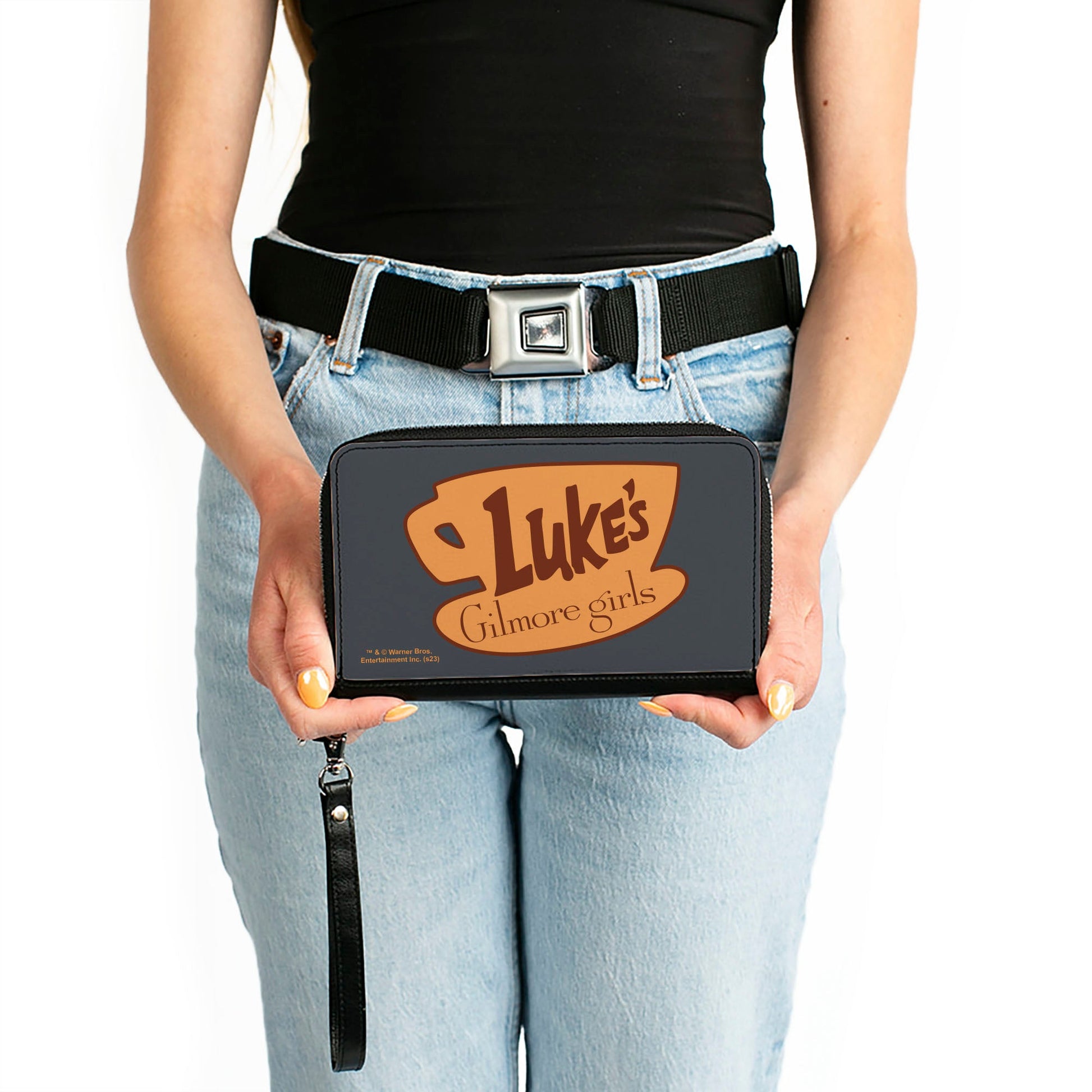 Close-up of Luke's Diner coffee cup logo on grey vegan leather